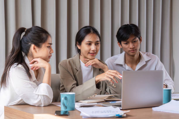 istock Business Team Collaborating and Exchanging Ideas in a Modern Office Setting 2162090462