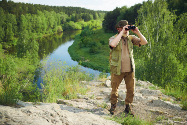 Park Rangers Using Hand Lens 210+ Park Ranger Forest Binoculars Nature Stock Photos, Pictures ...