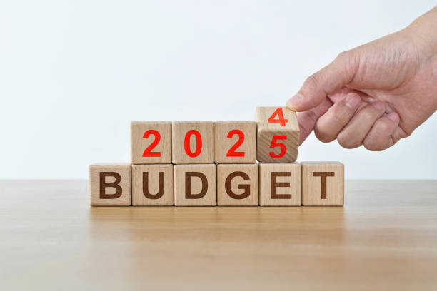 istock Number 2024 change to 2025 with word budget on the table 2162094740