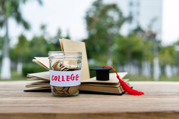 istock Coins in Jar with word COLLEGE 2162094819
