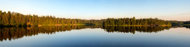 istock morning landscape with reflections on a forest lake 2162094897