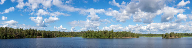 istock landscape with clouds on a forest lake 2162094930