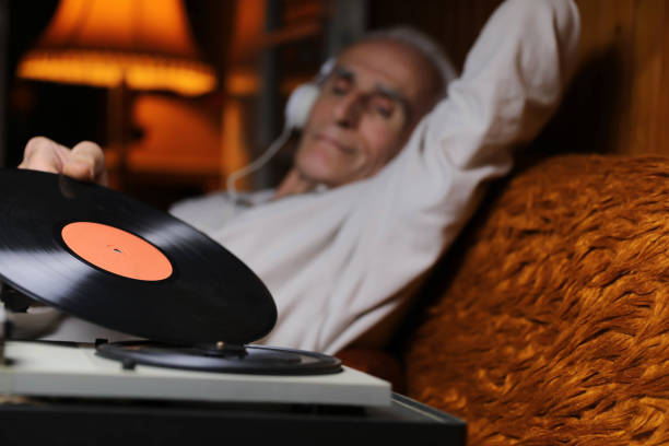 istock An elderly man listens to vinyl records. 2162095230
