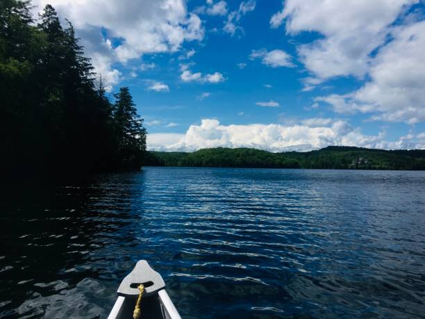 istock Canoe on a canadian lake 2162095247