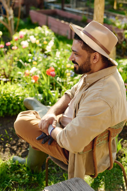 istock Farmer enjoying rest in the garden 2162095608