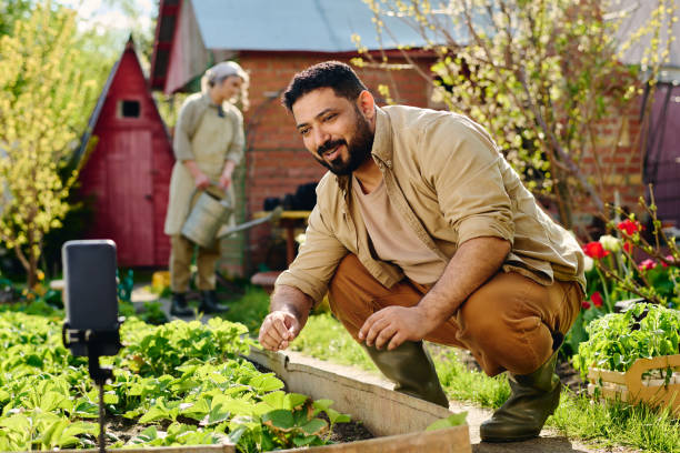 istock Mature farmer creating gardening vlog 2162095780