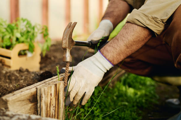 istock Man hitting metallic nail with hammer 2162097746