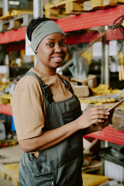 istock Female Factory Worker With Digital Tablet 2162099245