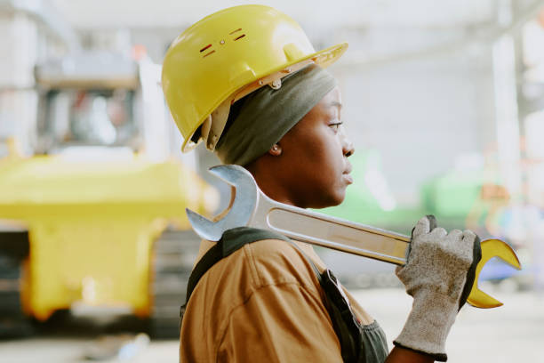 istock Female Factory Worker With Wrench 2162099480