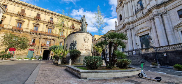 Downtown street view, Milan, Italy in the morning. The monument to Giuseppe Garibaldi in the front and Castello Sforzesco in the background.