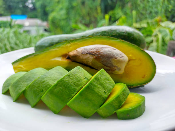 istock avocado slice on the white plate 2162105424
