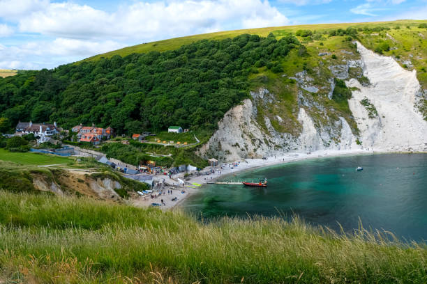 istock Lulworth Cove and beach view in Dorset, UK 2162108128
