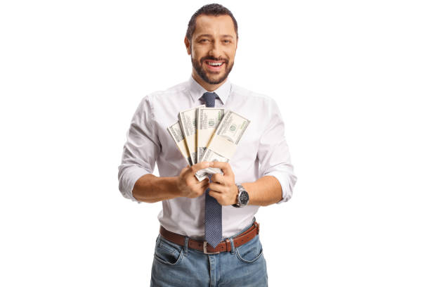 istock Businessman holding money and smiling 2162108918