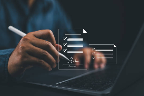 istock Electronic signature concept, business people sign electronic documents on digital documents, paperless office, future business contract signing. 2162112618