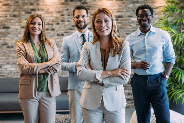 istock Confident businesswoman and her team. 2162112733