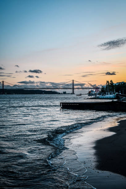 istock Dusk Falling Over Belem Docks On Tagus River In Lisbon, Portugal 2162112784