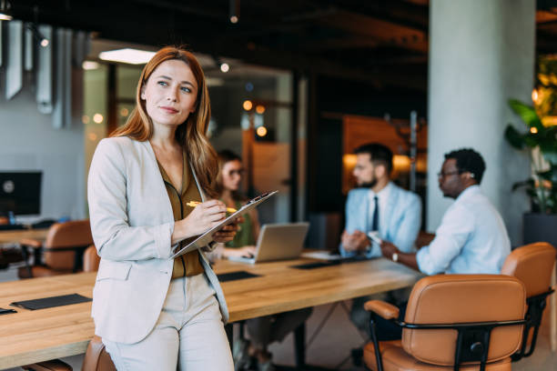 istock Confident businesswoman and her team. 2162113024