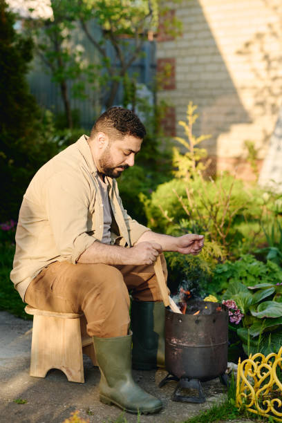 istock Farmer burning weeds and other garbage 2162113309