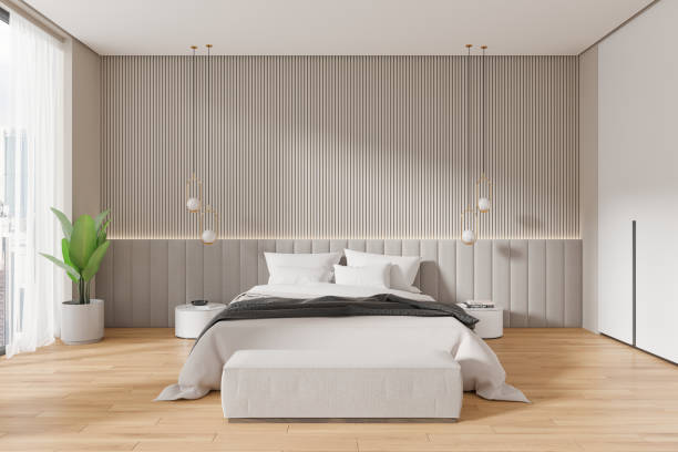 istock Stylish home bedroom interior with bed and nightstand, panoramic window 2162115683