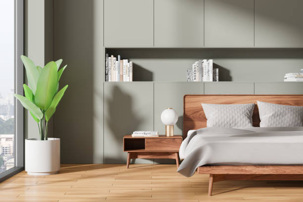 istock Stylish home bedroom interior with bed and nightstand, panoramic window 2162116109