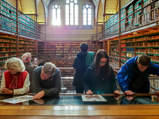 Amsterdam, Netherlands - Dec 1, 2019: Visitors in the Rijksmuseum Research Library. Also Cuypers Library. Largest and oldest public art history research library in the Netherlands. Opened in 1885.