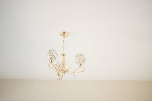 Elegant home lighting fixture with a sleek and modern design, illuminating the room with a warm ambiance