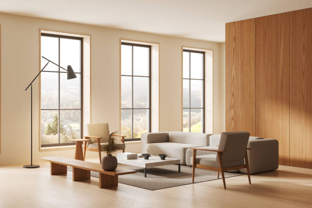 istock Scandinavian living room interior with two armchairs and couch, panoramic window 2162116560