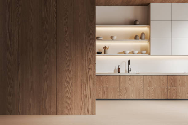 istock Wooden home kitchen interior with cooking cabinet and empty wall 2162117277