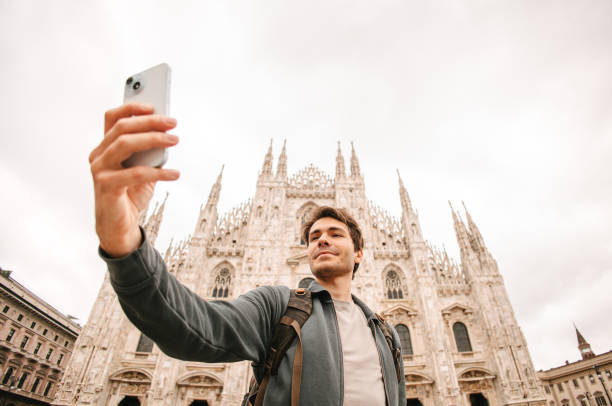istock Tourist taking selfie in Milano 2162118050