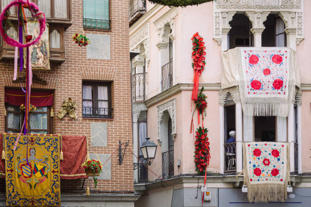 Toledo, Spain, June 18th, 2014: Festive adornments on Toledos facades for Corpus Christi procession