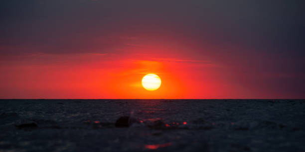 istock Sunset over the sea 2162125287
