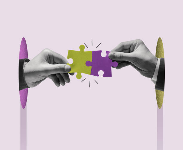 coordinated teamwork. business concept. - パズルピース ストックフォトと画像