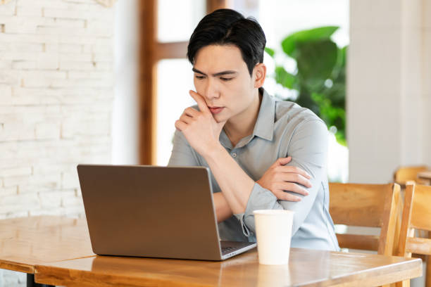 istock Young business man working at a coffee shop 2162126380