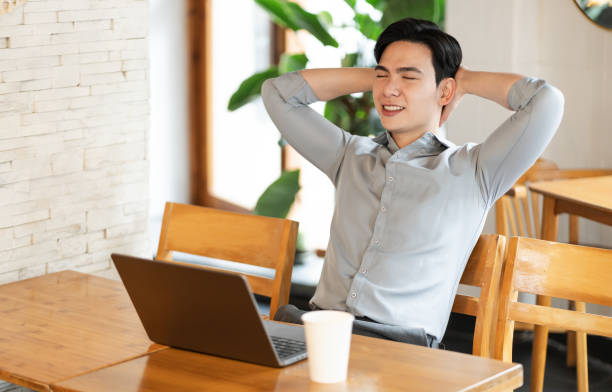 istock Young business man working at a coffee shop 2162127044