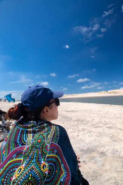 Woman on Valiza beach in Uruguay on a summer day