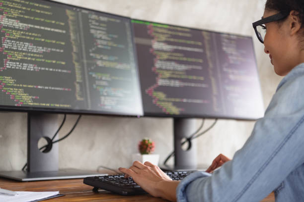 istock Cropped photo of young girl professional hacker write keyboard debugging loft interior modern office indoors 2162130854
