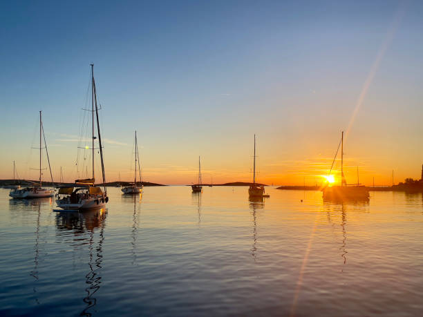 istock yachts at the red sunset 2162133116
