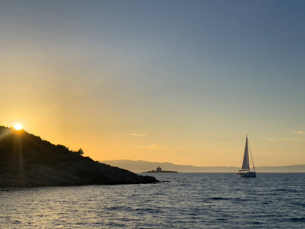 istock sunset at the sea 2162133511