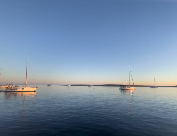 istock boat at the sunset 2162133750