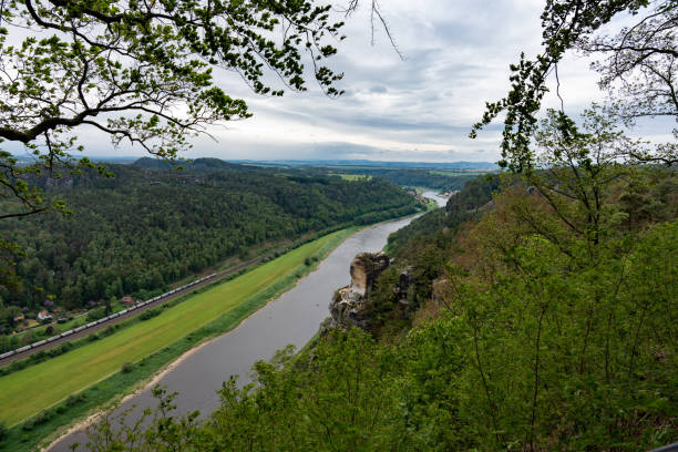 istock A river with a green forest in the background 2162133784
