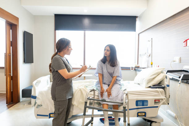 istock Female patient listens to nurse's instructions 2162134809