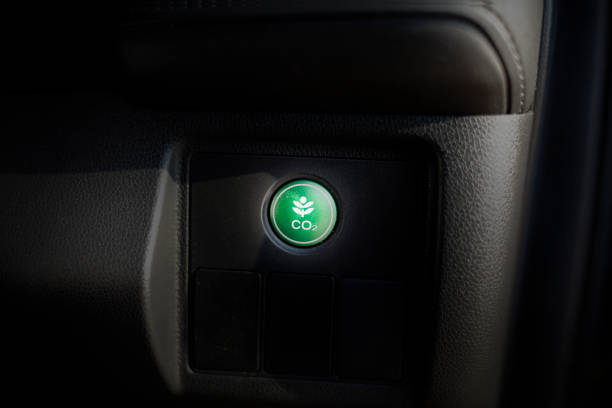 istock co2 button Reduce CO2 emission concept. Clean and friendly environment without carbon dioxide emissions. 2162135579