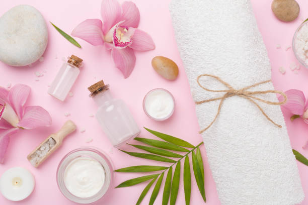 istock Composition with orchids, spa products on color background, top view 2162136382