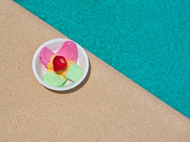 istock Frozen fruit sherbet dessert with strawberry poolside on a hot day 2162136922
