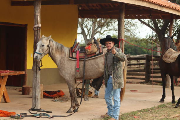 istock cowboy taking care of cattle 2162137601