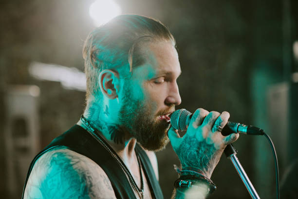 istock Caucasian Man Singing On Stage 2162138474
