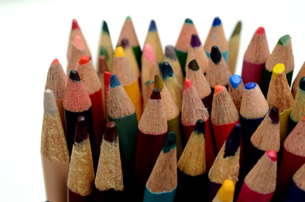 Colorful colored pencils on blurred bokeh nature background. The concept of preschool and school education