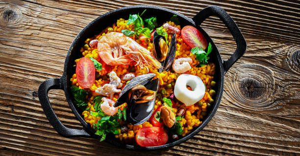 istock Seafood paella served in a cast iron pan 2162142086