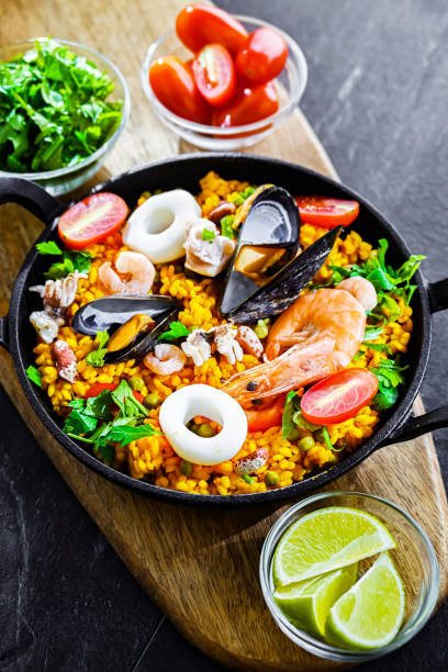 istock Seafood paella served in a cast iron pan 2162142095
