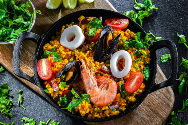 istock Seafood paella served in a cast iron pan 2162142105